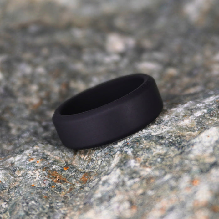 Black 8mm bevelled silicone ring shown at an angle