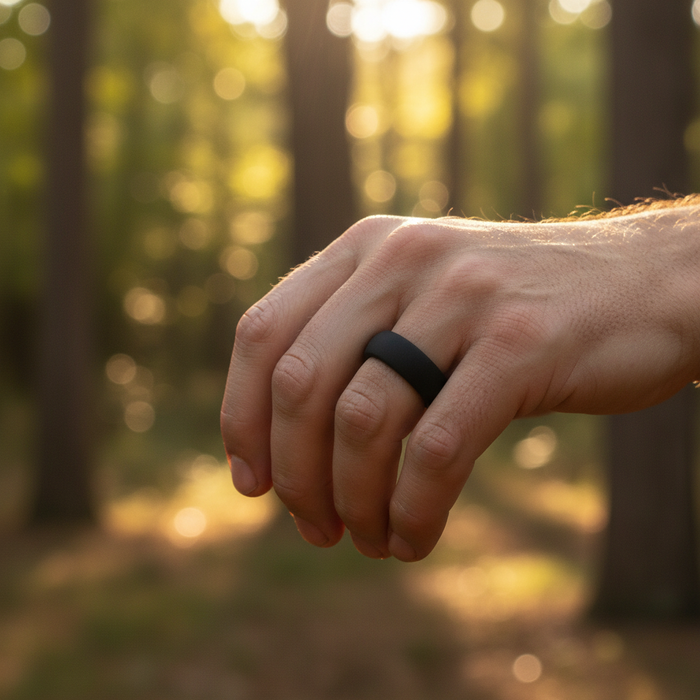 Black 8.7mm domed silicone wedding ring by Forge and Lumber