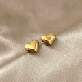 18K gold plated heart stud earrings in stainless steel by Forge and Lumber