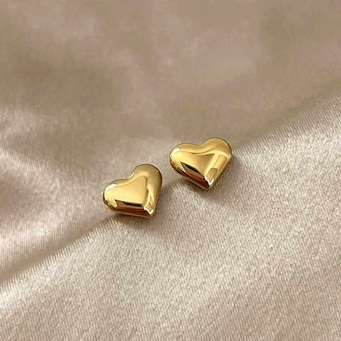 18K gold plated heart stud earrings in stainless steel by Forge and Lumber