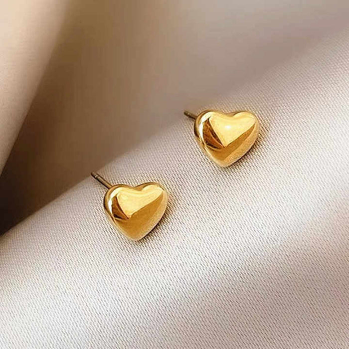 18K gold plated heart stud earrings in stainless steel by Forge and Lumber, perfect for daily wear.