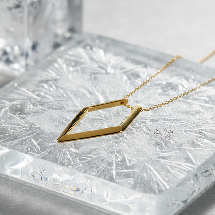 Forge and Lumber Ring Holder Necklace. 18k gold plated chain holds a ring.