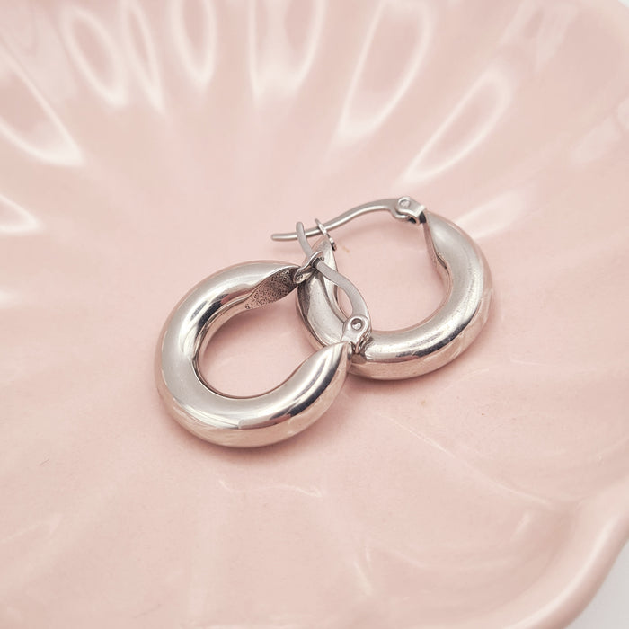Small chubby hoop earrings in silver, 18K gold plated stainless steel by Forge and Lumber.