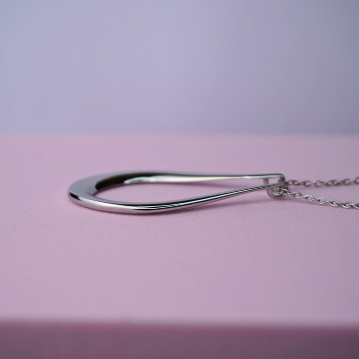 The Abalone ring holder necklace in silver, teardrop pendant