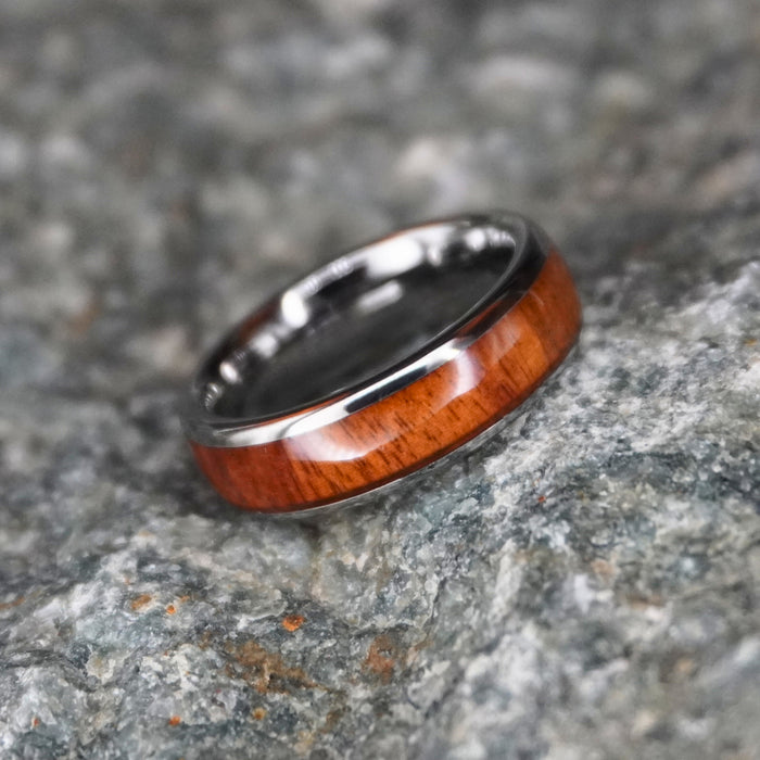 The Acacia 6mm tungsten ring showing the Koa wood grain