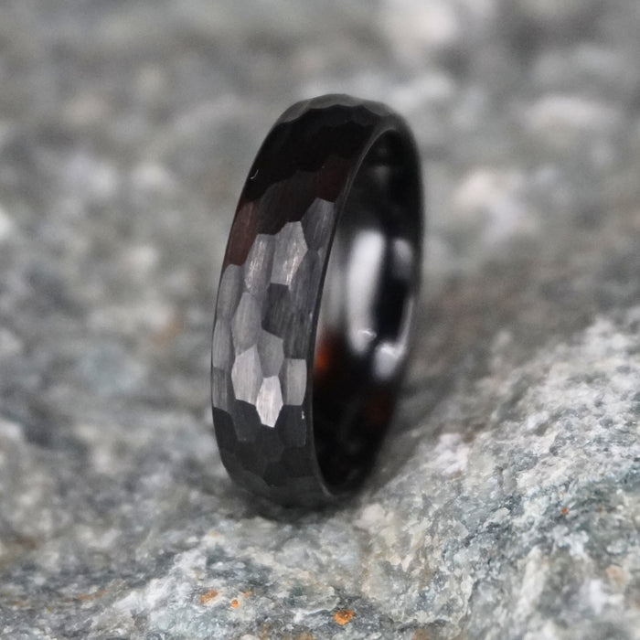 Black matte tungsten ring with hammered texture, 6mm band, by Forge and Lumber.