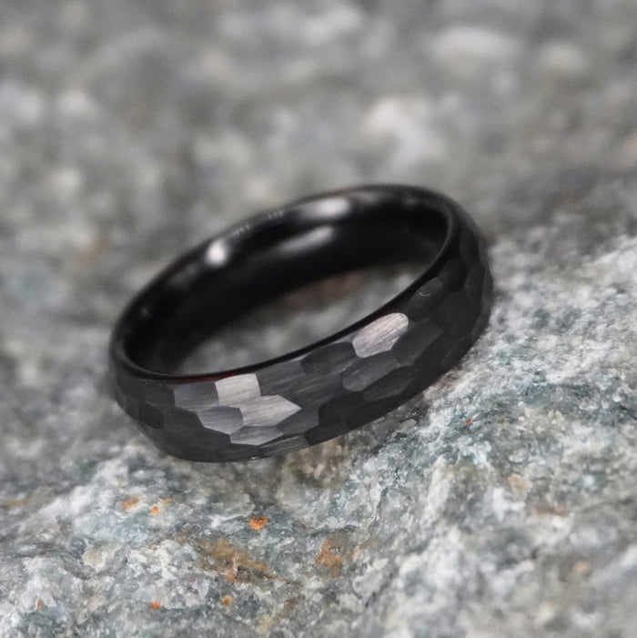 Black matte tungsten ring with hammered texture, 6mm width, by Forge and Lumber.