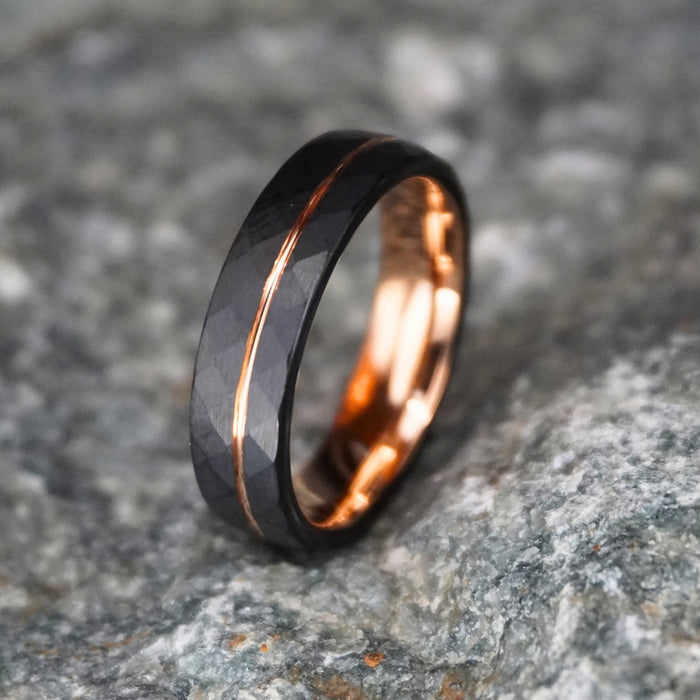 Black tungsten wedding band with rose gold accents, 6mm width, by Forge and Lumber.