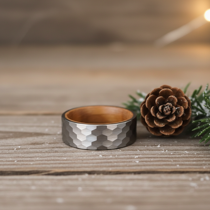 Hexagonal patterned tungsten ring with wooden inner band by Forge and Lumber.