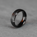 The Cannon, a 6mm gunmetal-plated tungsten band with a bevelled profile