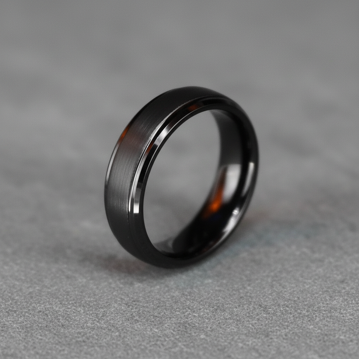 The Cannon, a 6mm gunmetal-plated tungsten band with a bevelled profile