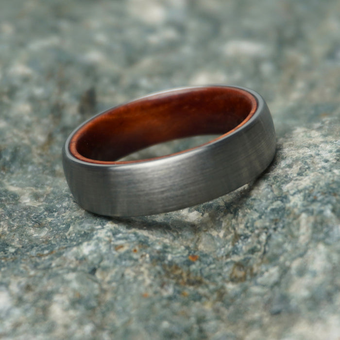 The Ember 6mm comfort-fit tungsten ring with a rosewood inlay