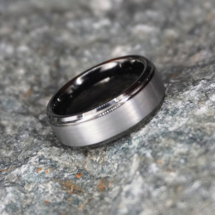 The Fortress 8mm bevelled gunmetal ring shown from the side