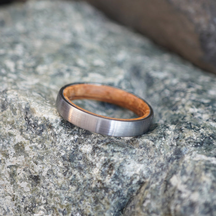 The Glen 4mm tungsten band showing the oak interior