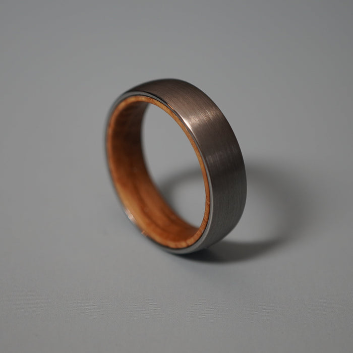 Studio photograph of The Glen 6mm with its oak barrel inlay