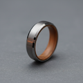 The Glencairn 6mm, a bevelled tungsten band with a whisky barrel oak interior