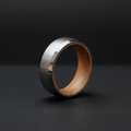 The Glencairn 8mm, a bevelled tungsten band with a whisky barrel oak interior