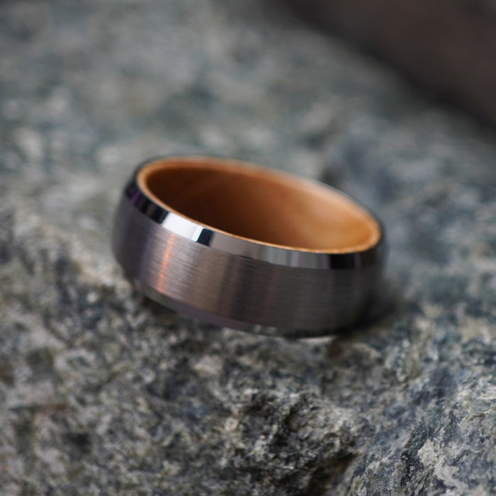 The Glencairn 8mm tungsten ring showing the barrel oak interior