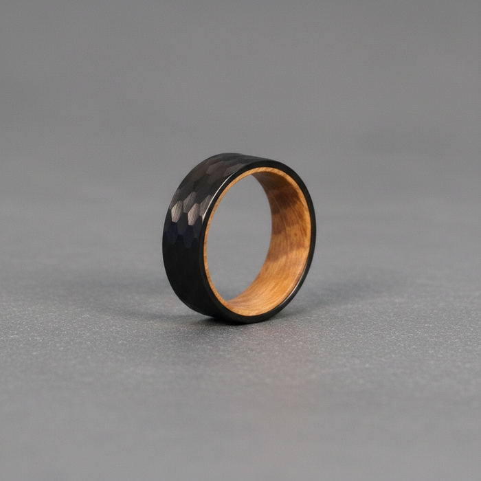 The Iona 8mm black tungsten ring with barrel oak interior