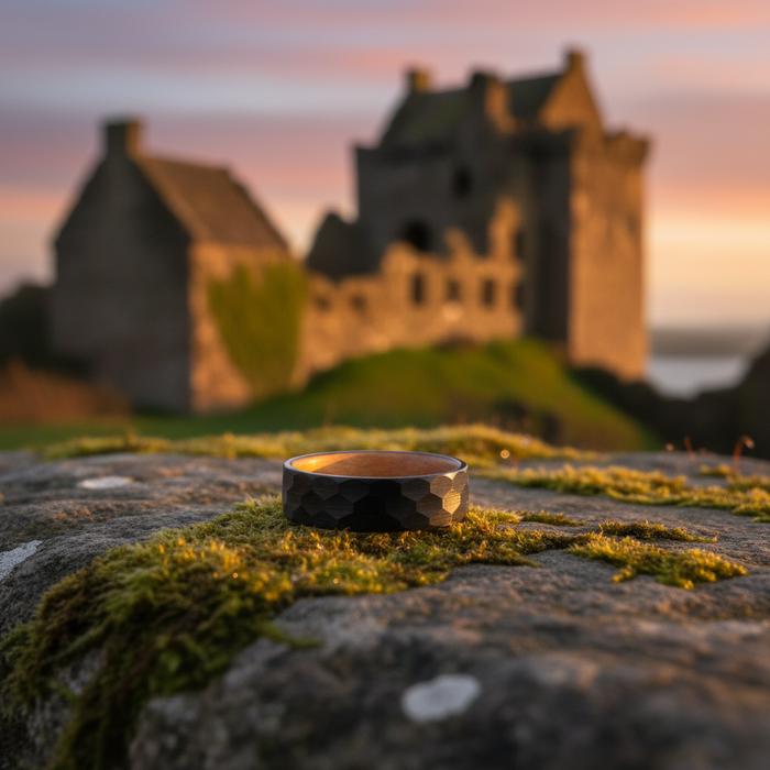 The Iona 8mm black band on mossy stone