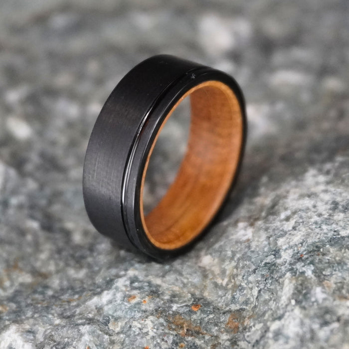 The Islay 8mm black tungsten ring with barrel oak interior