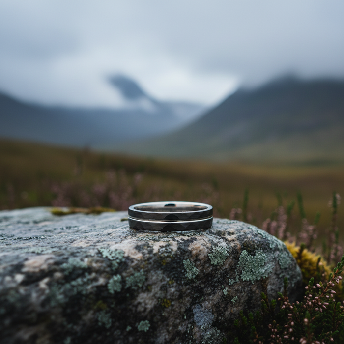 The Lode 4mm ring on a rocky surface