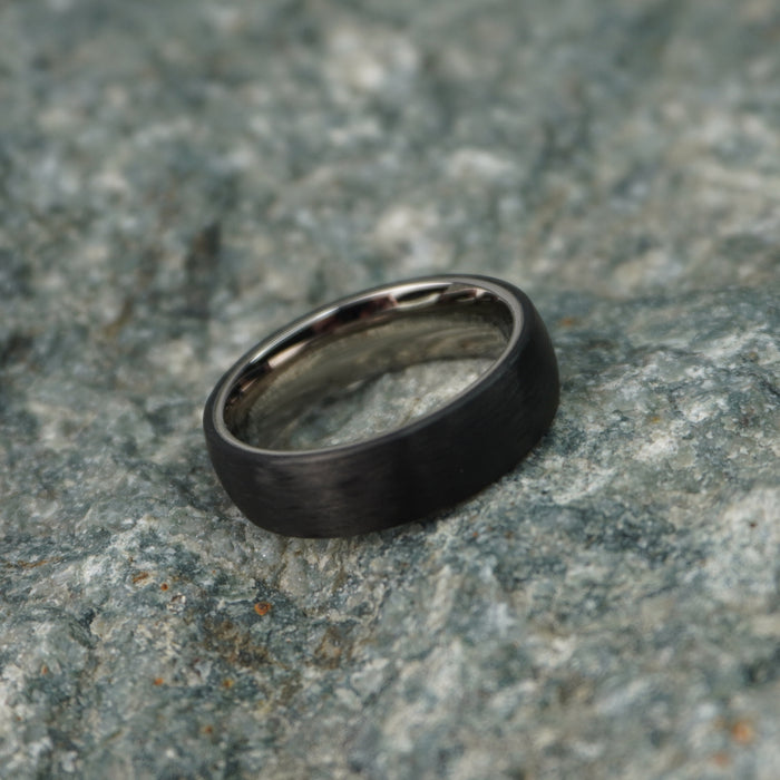 The Monaco 6mm carbon fibre ring shown at an angle