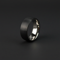 The Monaco 8mm, a round-profile titanium band with a carbon fibre inlay