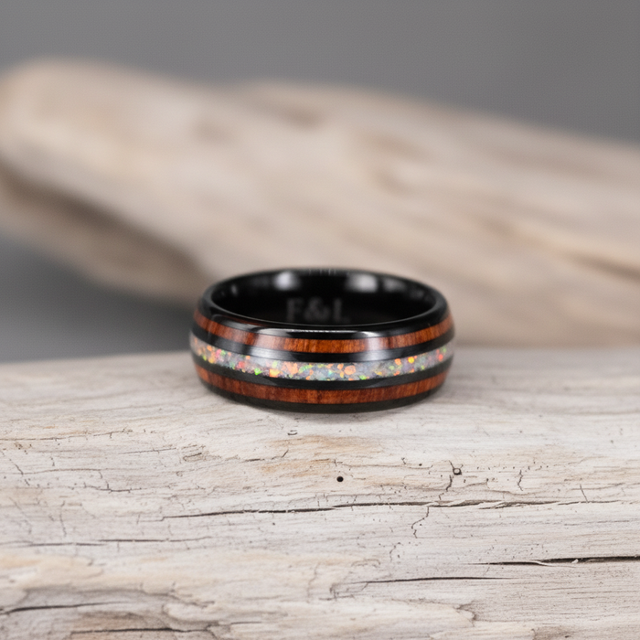 The Opallios 8mm black tungsten ring with opal and Koa wood inlays