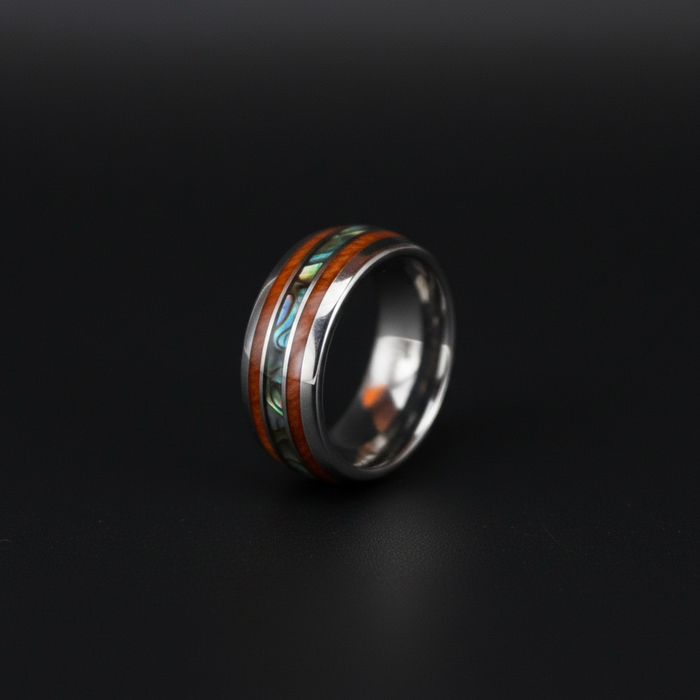 The Paua, an 8mm tungsten band with Paua shell and Koa wood inlays