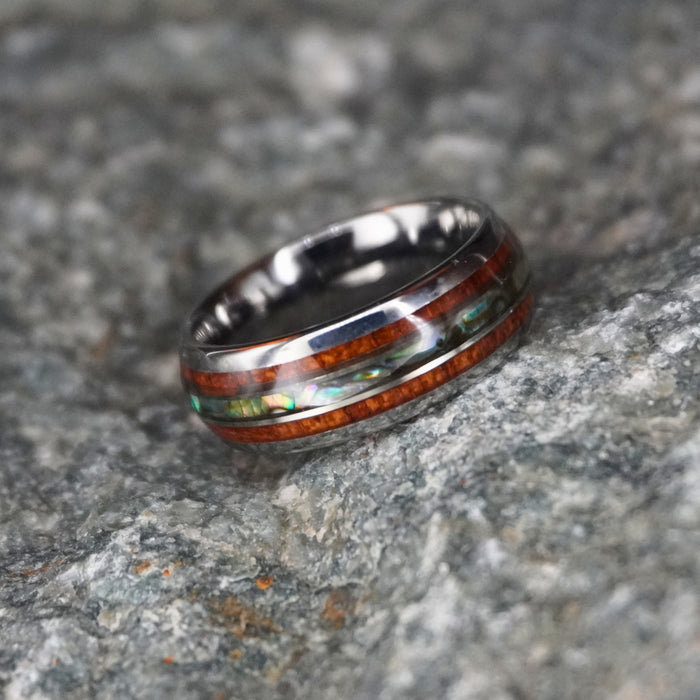 The Paua 8mm tungsten ring with a Paua shell inlay