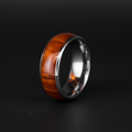 The Royal, an 8mm round-profile tungsten band with a Koa wood inlay
