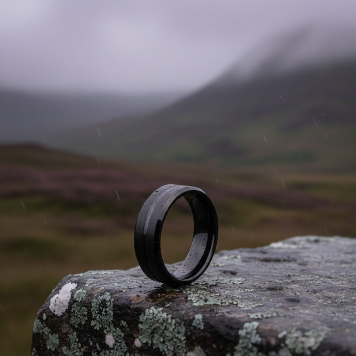 The Waka 8mm bevelled ring against a natural landscape