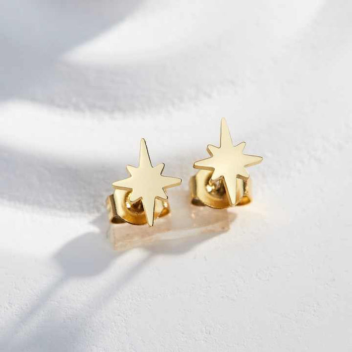 18k gold-plated star stud earrings by Forge and Lumber, hypoallergenic and perfect for everyday wear.