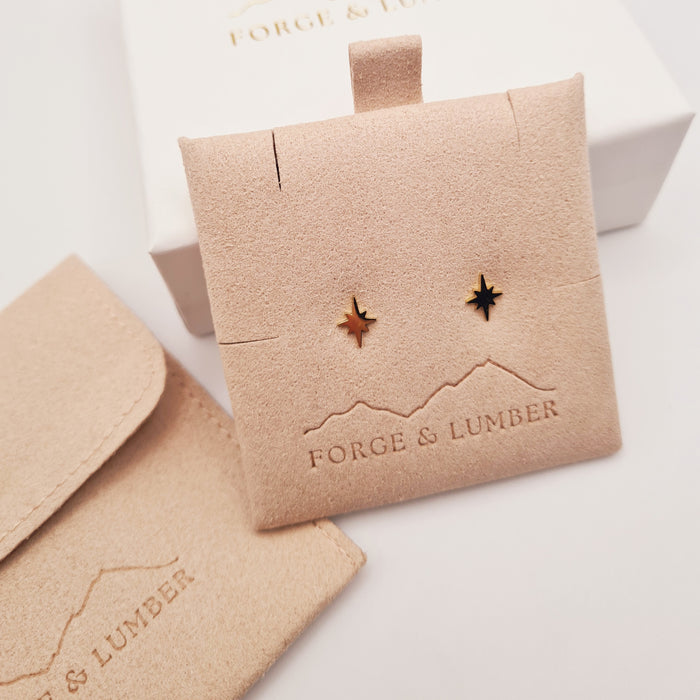18k gold-plated star stud earrings by Forge and Lumber, hypoallergenic design for everyday wear.