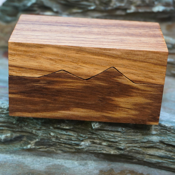 Handcrafted wooden ring box with a unique zigzag design by Forge & Lumber, perfect for engagement ring storage.